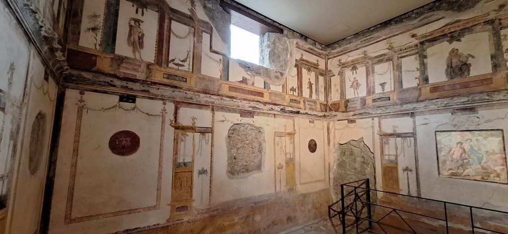 Decoración mural de la casa de los Vetii de Pompeya